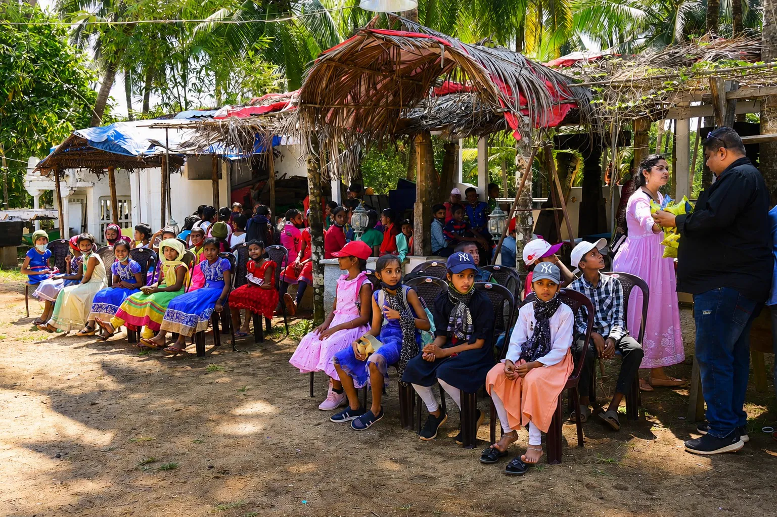 Kids seated by the art workshop area