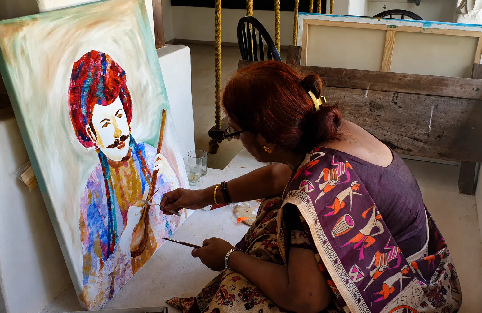 Artist w. their work