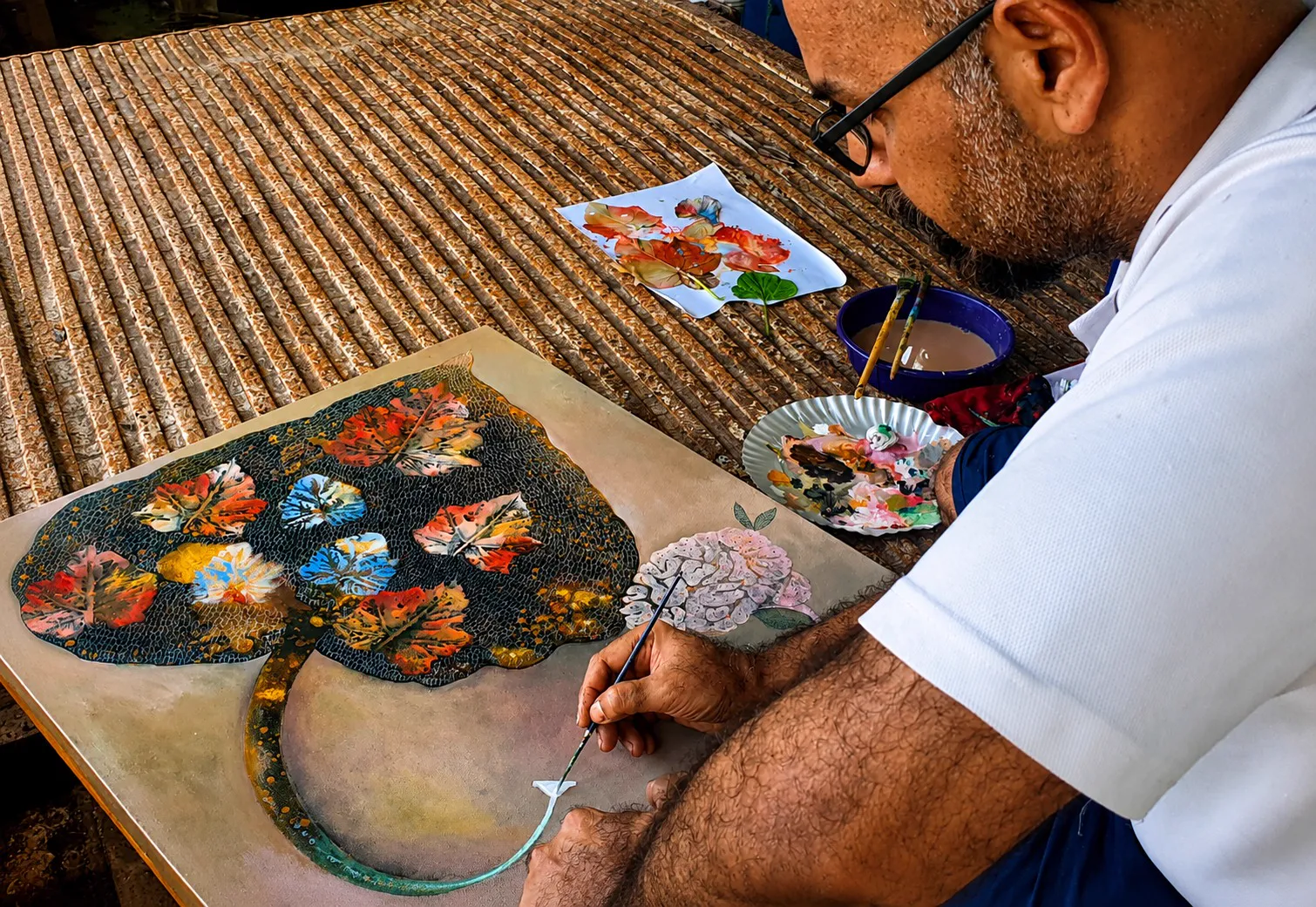 Artist w. their work