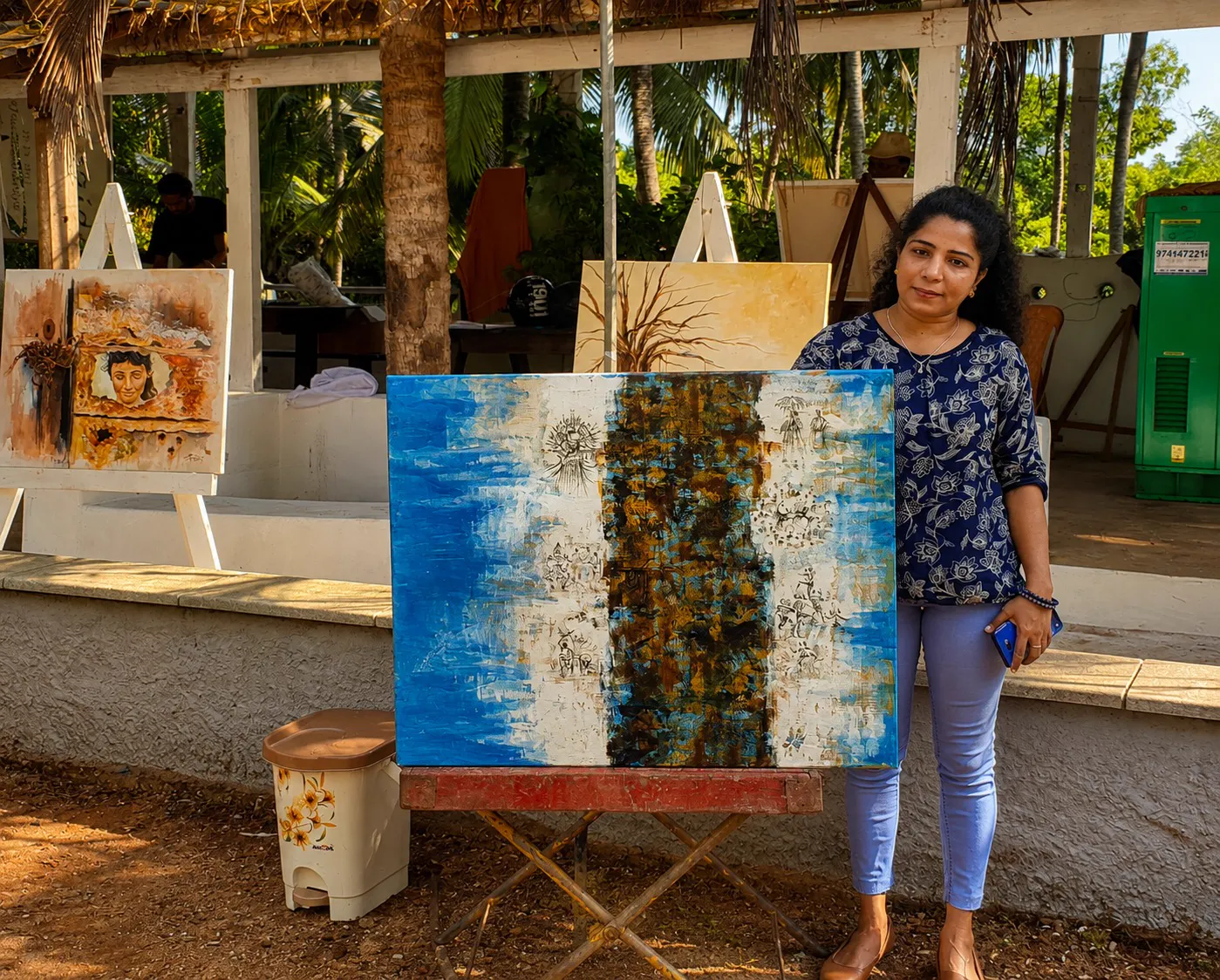 Artist w. their work
