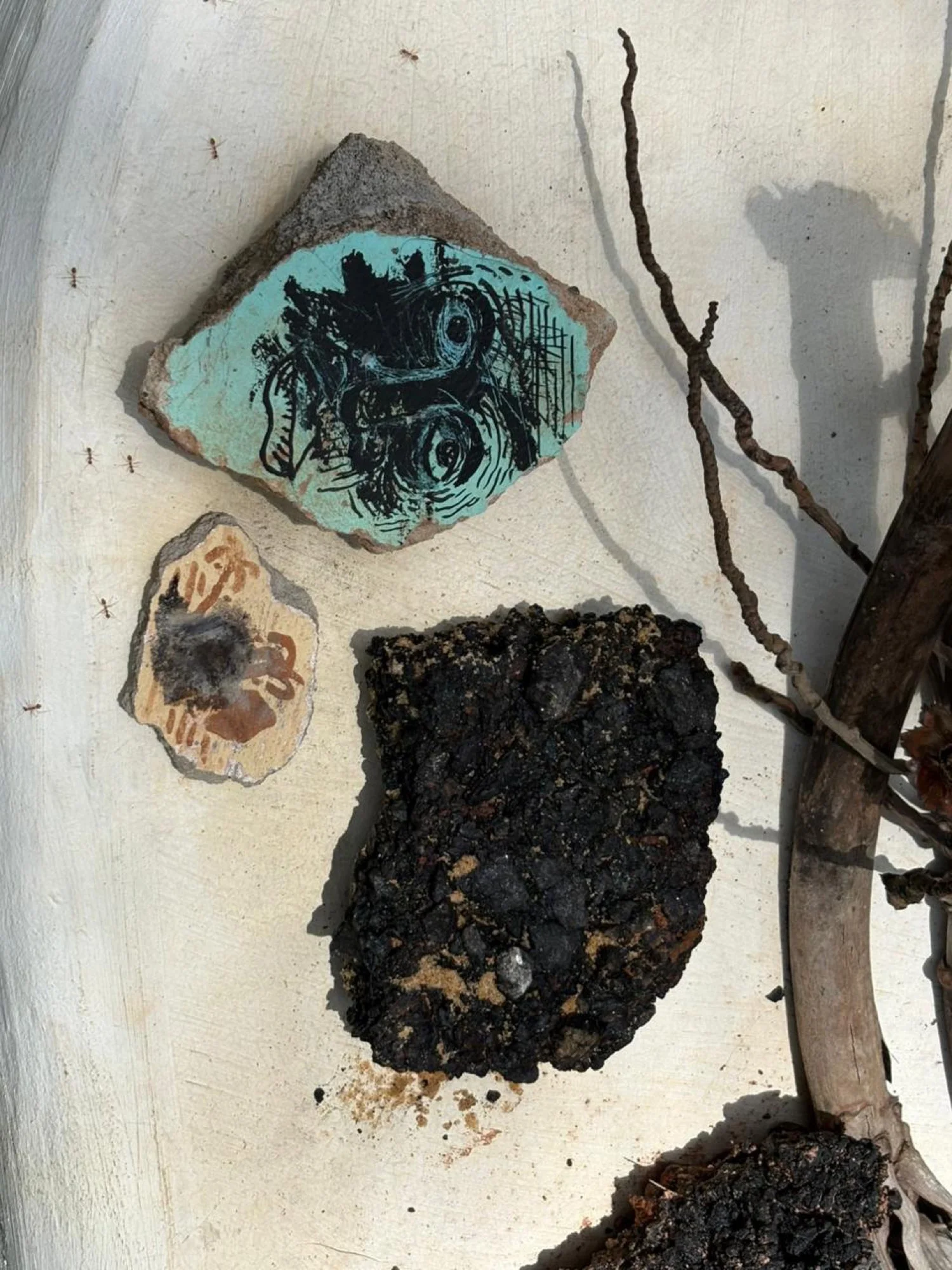 From the Atlas of Loss series — beach clays and coconut-ash pigment on paper